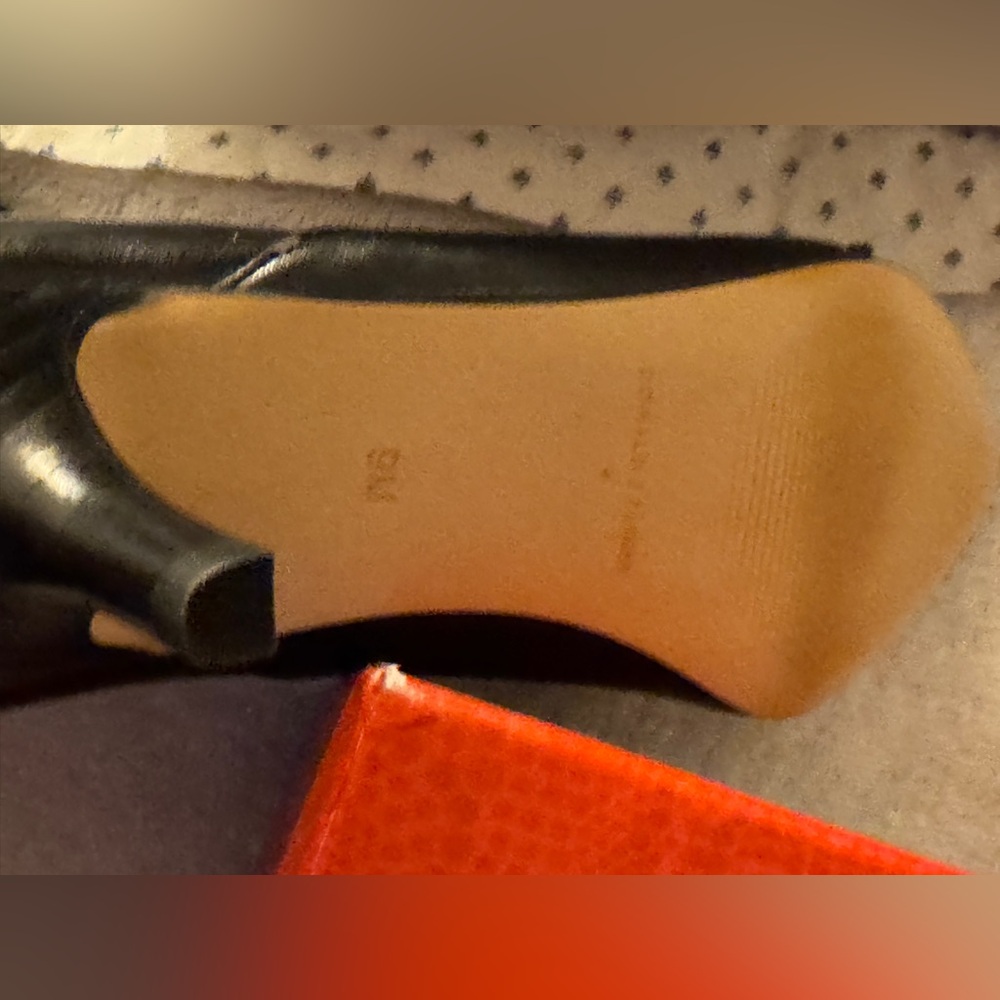 From Neiman Marcus Donald Kleiner black to the knee boot